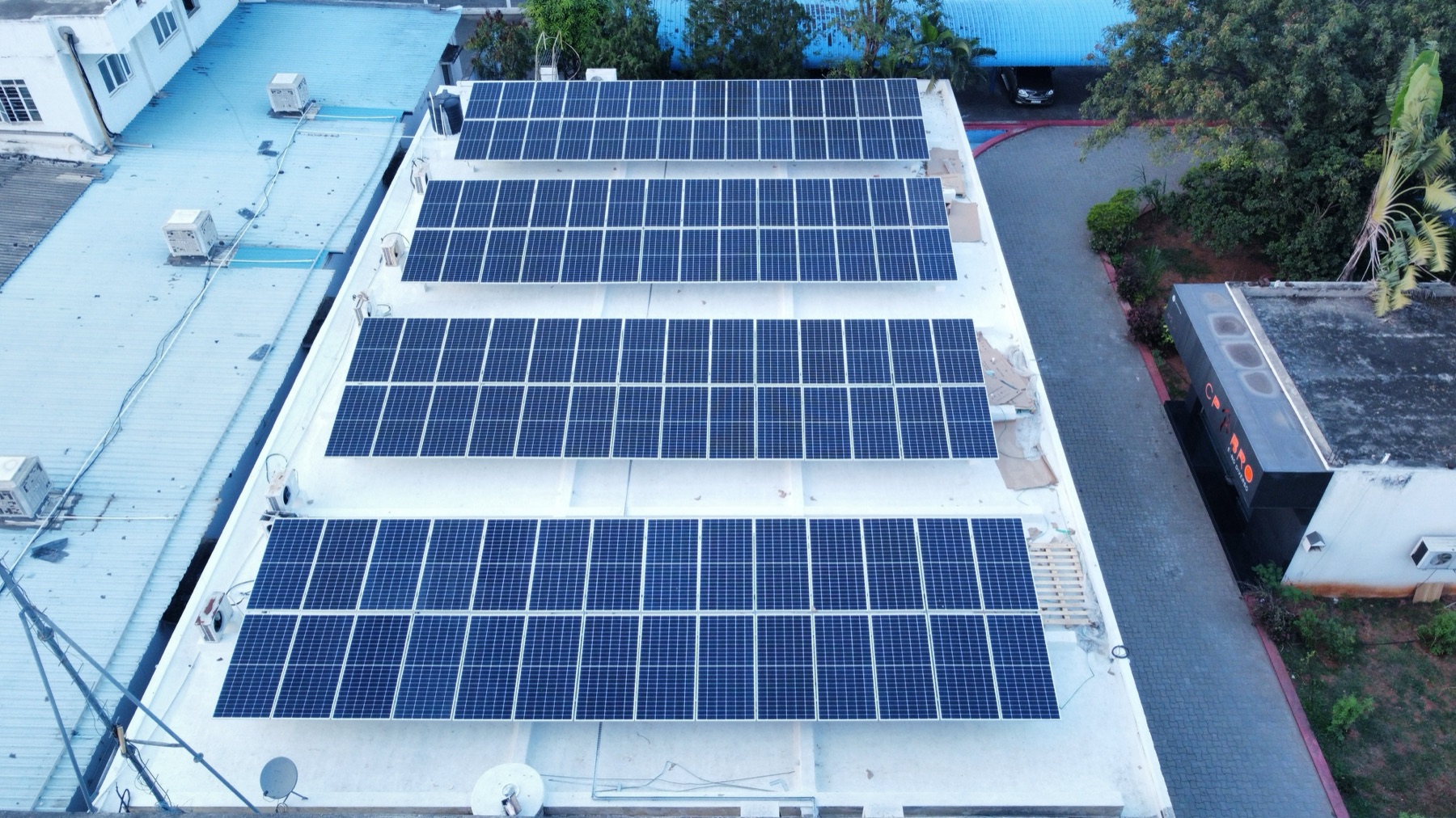 Rows of solar panels mounted on a Classic Polo factory roof