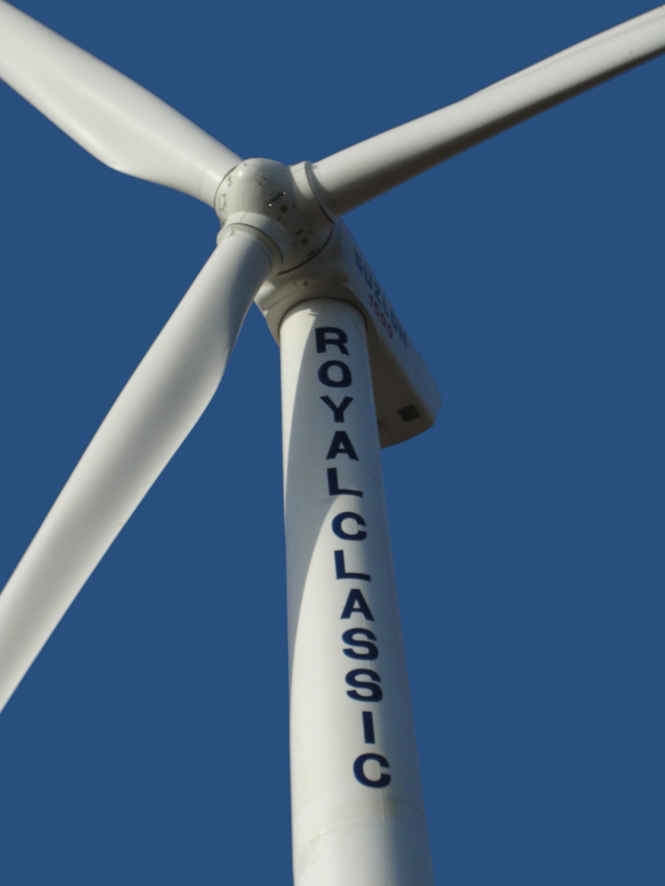 Close view of a Classic Polo wind turbine tower and blades